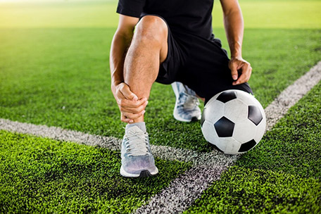 Athlete receiving sports injury treatment at Kalamazoo Foot Surgery
