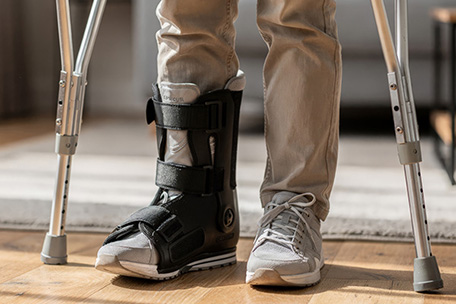 footfractures Crutches and boot after foot fracture